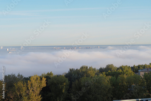Morning fog over the city and the river.