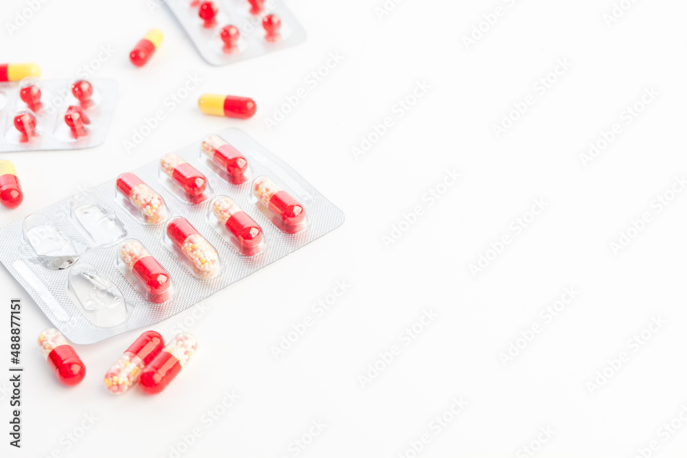 Colorful pills on a white background. Copy space for a text Colorful pills on a white background. Copy space for a text