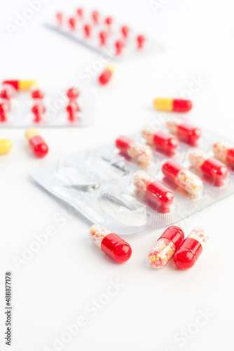 Colorful pills on a white background