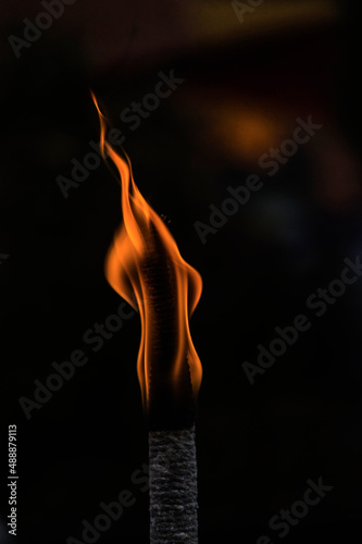 orange fire torches on light blue background © fransuarez