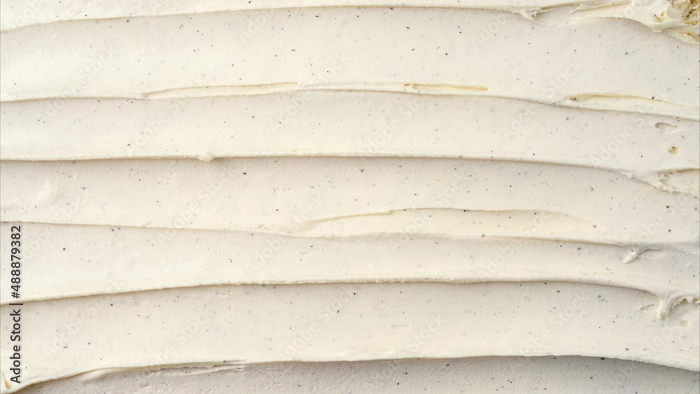 Stop motion of delicious and refreshing vanilla ice cream surface. Top view. Summer season. 4K UHD