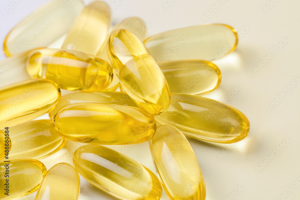 Close up of oil filled capsules suitable for: fish oil, omega 3, omega 6, omega 9, vitamin A, vitamin D, vitamin D3, vitamin E - Image Close up of oil filled capsules suitable for: fish oil, omega 3, omega 6, omega 9, vitamin A, vitamin D, vitamin D3, vitamin E - Image
