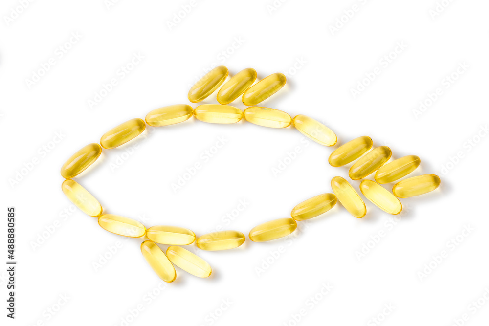 Omega 3 capsules - fish shape, isolated on white background- Image Omega 3 capsules - fish shape, isolated on white background- Image