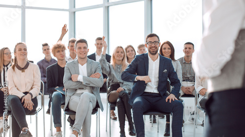 business coach at a meeting with a group of young business people