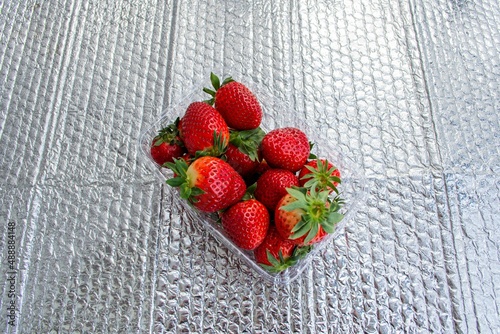 Big ripe strawberries in a bowl