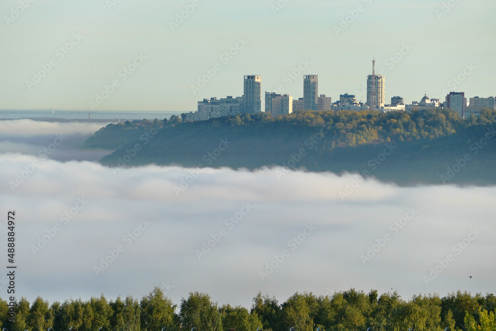 Fog over the city of utor. Autumn morning fog.
