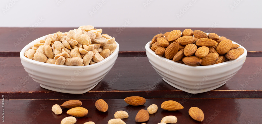Almonds and peanuts. Nuts are necessary in a healthy diet. Almonds and peanuts. Nuts are necessary in a healthy diet.