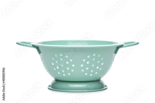 Side view of a Green Metal Colander isolated on white.