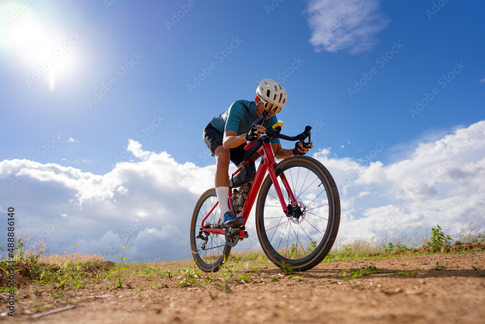 Cyclists practicing on gravel roads