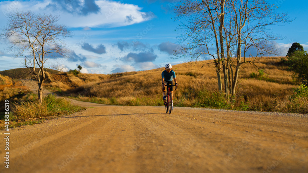 Cyclists practicing on gravel roads