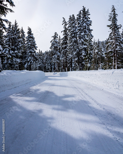 cascade mountain roadway in winter with snow and ice