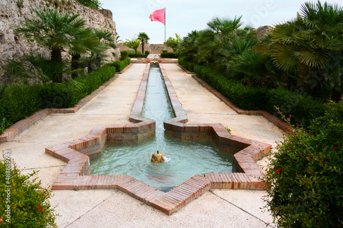 Fountain in the IBN HAZM gardens of the castle of Xativa (Valencia, Spain)