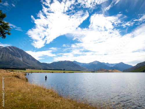 Fishermen fish for trout around the edge of Lake Grassmere, Canterbury, New Zealand photo