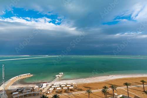 Fototapeta Naklejka Na Ścianę i Meble -  View of the Dead Sea and beach from a hotel room on an upper floor
