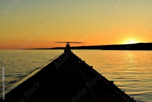 sunset on the lighthouse pier