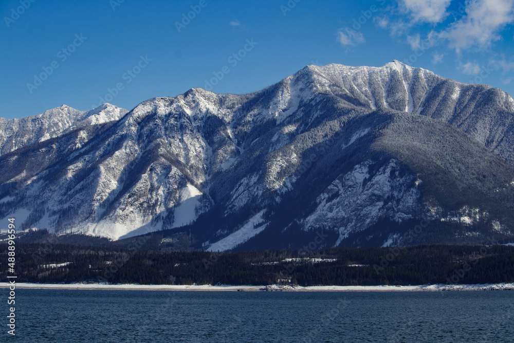 Snow covered mountains beside the Arrow Lakes