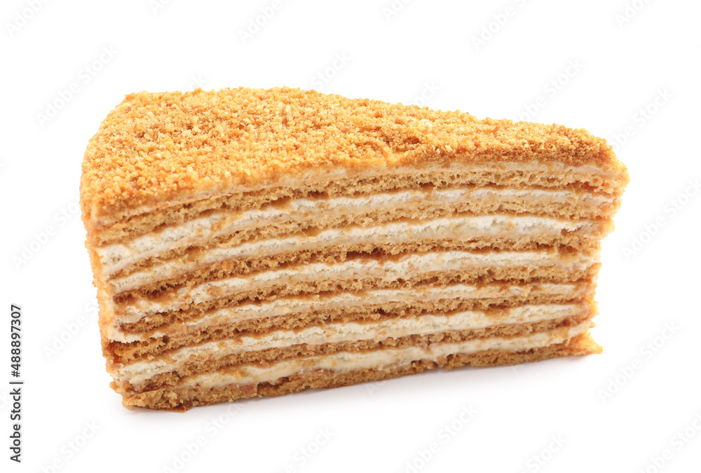 Slice of delicious honey cake isolated on white Slice of delicious honey cake isolated on white
