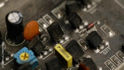 Rotation of the electrical circuit of the sound amplifier. Small items. Macro.