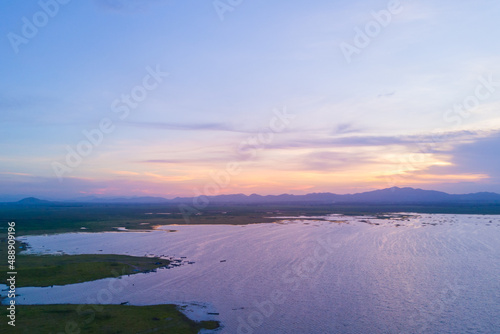 Beautiful landscape aerial view of sunset over lake as a mountain background, Nature Background