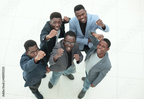 group of successful young people looking at the camera