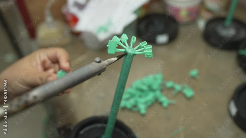 Jewelry craftsmen forming candles to make jewelry molds in a factory. Making wax jewelry before casting,process of making jewelry.