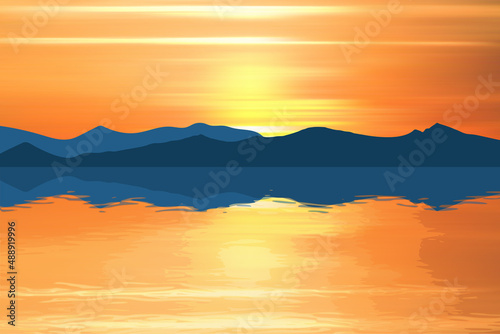 Fantasy on the theme of the sea landscape, summer vacation. The mountains on the horizon, the picturesque sunset sky, a beautiful reflection in the water. © Valerii