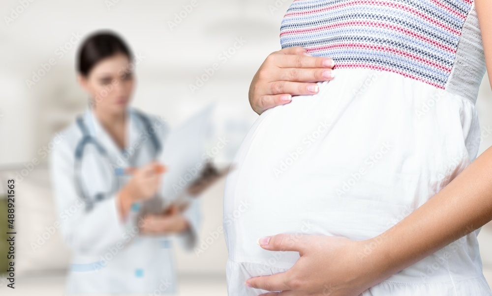 Preparing for baby birth. Woman expecting baby having appointments with doctor at antenatal clinic prenatal healthcare center. Preparing for baby birth. Woman expecting baby having appointments with doctor at antenatal clinic prenatal healthcare center.