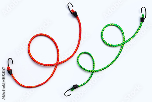 Braided elastic strap with hooks on white background.