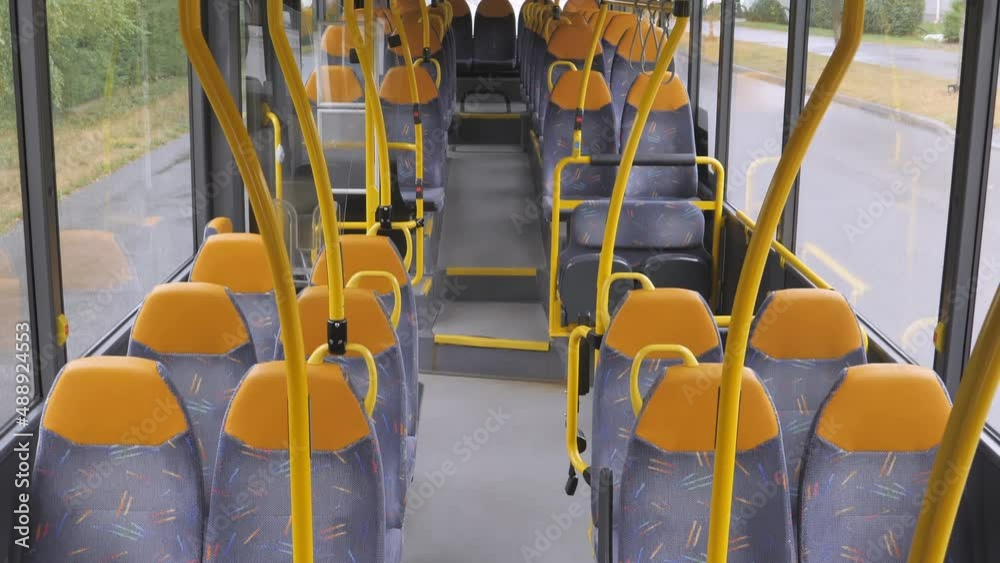 A look inside the bus public transport in Helsinki Finland with the gray color seats inside A look inside the bus public transport in Helsinki Finland with the gray color seats inside