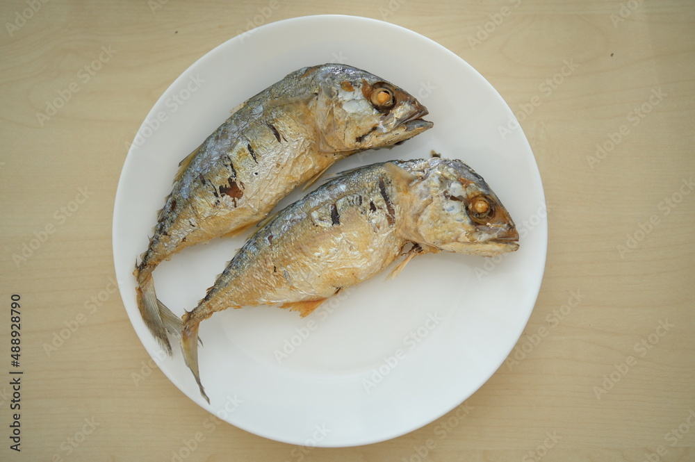 fried fish on white plate fried fish on white plate