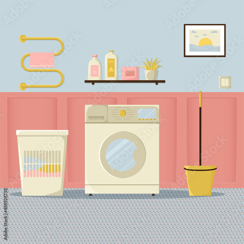 Washing machine with dry clothes in the basket and detergent. Electronic laundry equipment for housekeeping.