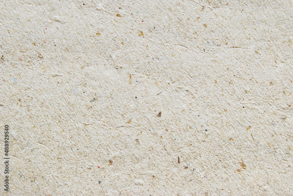 Brown fibrous recycled craft paper texture as background Brown fibrous recycled craft paper texture as background