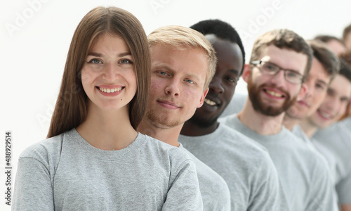 group of diverse young people standing in a row