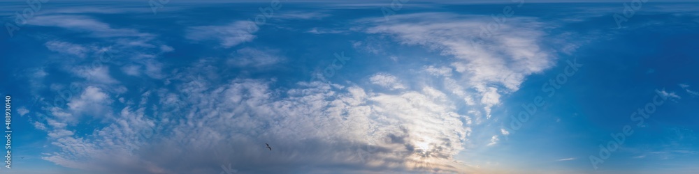 Blue sky panorama with Cirrus clouds in Seamless spherical equirectangular format. Full zenith for use in 3D graphics, game and editing aerial drone 360 degree panoramas for sky replacement. Blue sky panorama with Cirrus clouds in Seamless spherical equirectangular format. Full zenith for use in 3D graphics, game and editing aerial drone 360 degree panoramas for sky replacement.