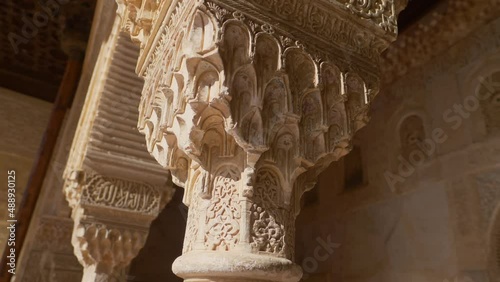 Alhambra palace in Granada, Andalusia, Arabian style interior detail of moorish castle of Alhambra in Spain, famous tourist destination 