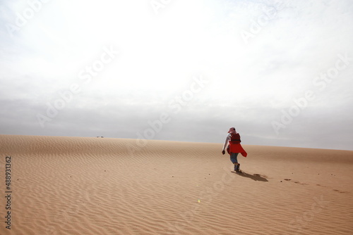 Chinese tourists trekking in Alxa desert