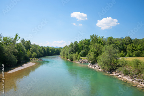 green Isar river, with trees at the riverside, near Arzbach Lenggries, upper bavaria