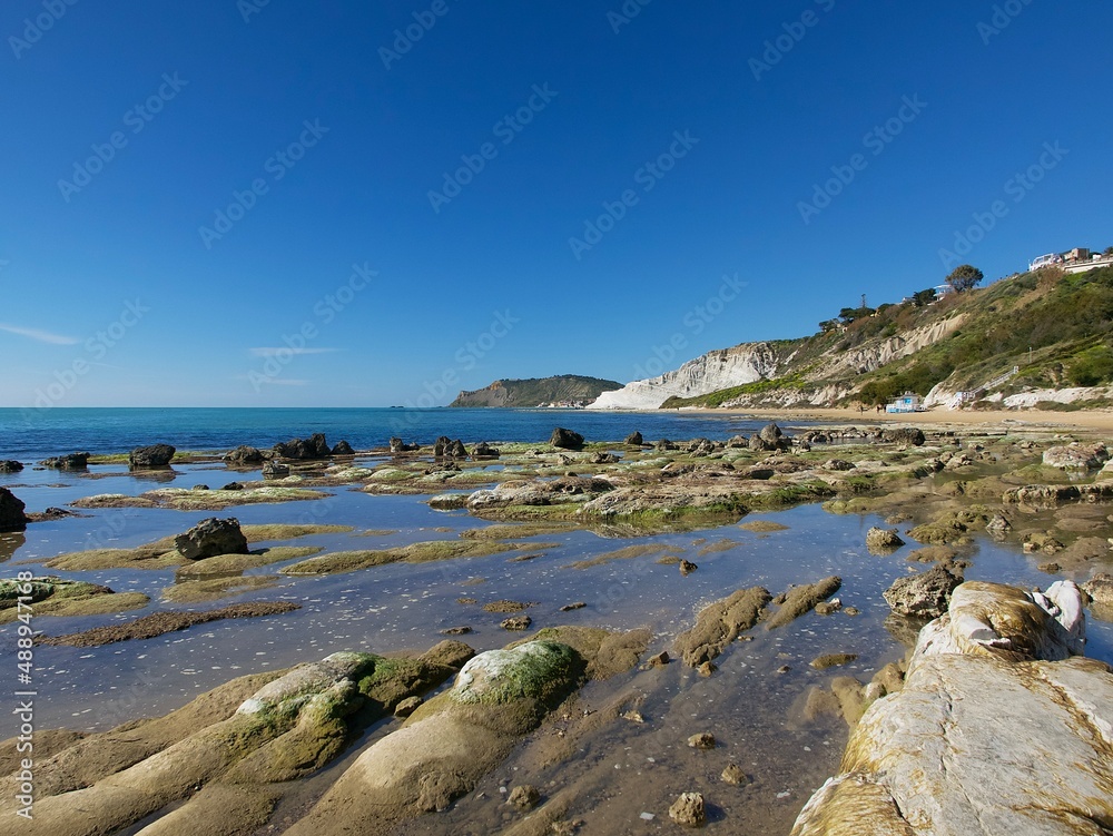 view of the beach in Realmonte, Agrigento against the blue sky on a clear sunny day, Sicily