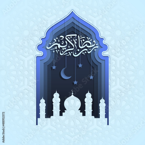 Illustration of Ramadan Kareem in paper cut style with Arabic calligraphy, arabesque pattern, and mosque. Beautiful Islamic greeting card with mosque gate in blue color. Ramadan Kareem calligraphy