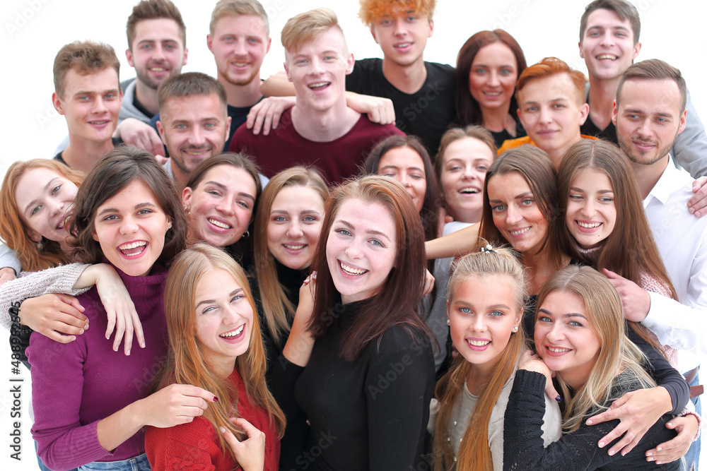 group of confident young people looking at the camera and showing their success group of confident young people looking at the camera and showing their success