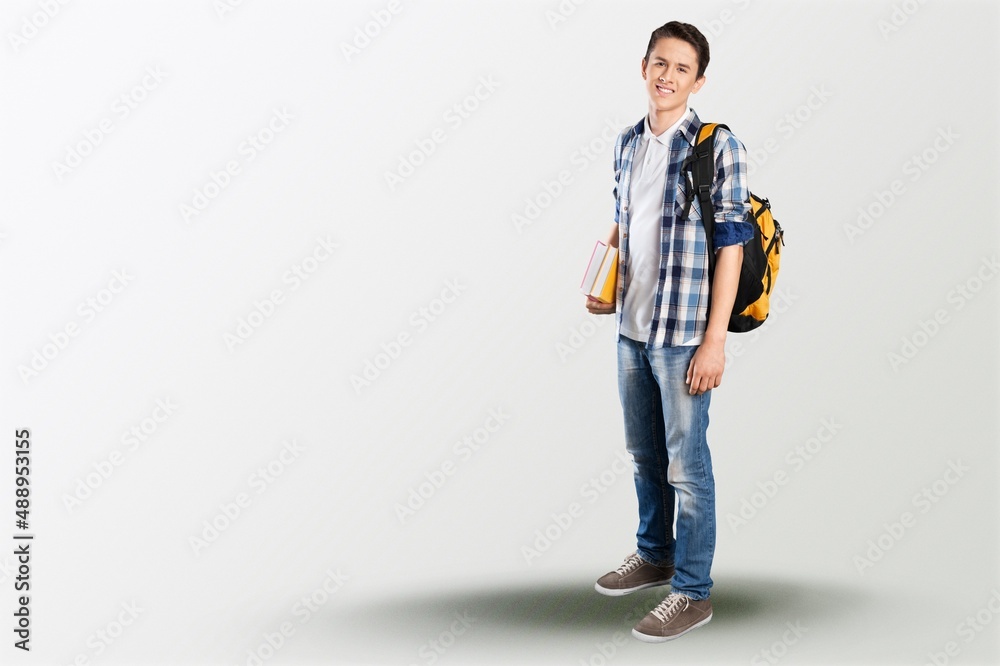 Happy young student posing with a backpack Happy young student posing with a backpack