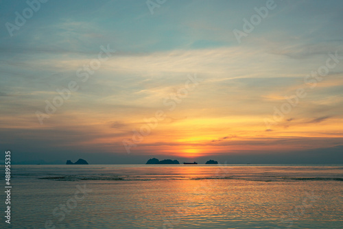 Spectacular colorful sunset over sea and islands on a summer evening. 