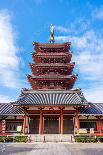 Front view of Japanese Buddhist five-storeyed pagoda at Senso-ji Temple. The temple is oldest ancient Buddhist temple and famous landmark located in Asakusa, Tokyo, Japan, Asia.