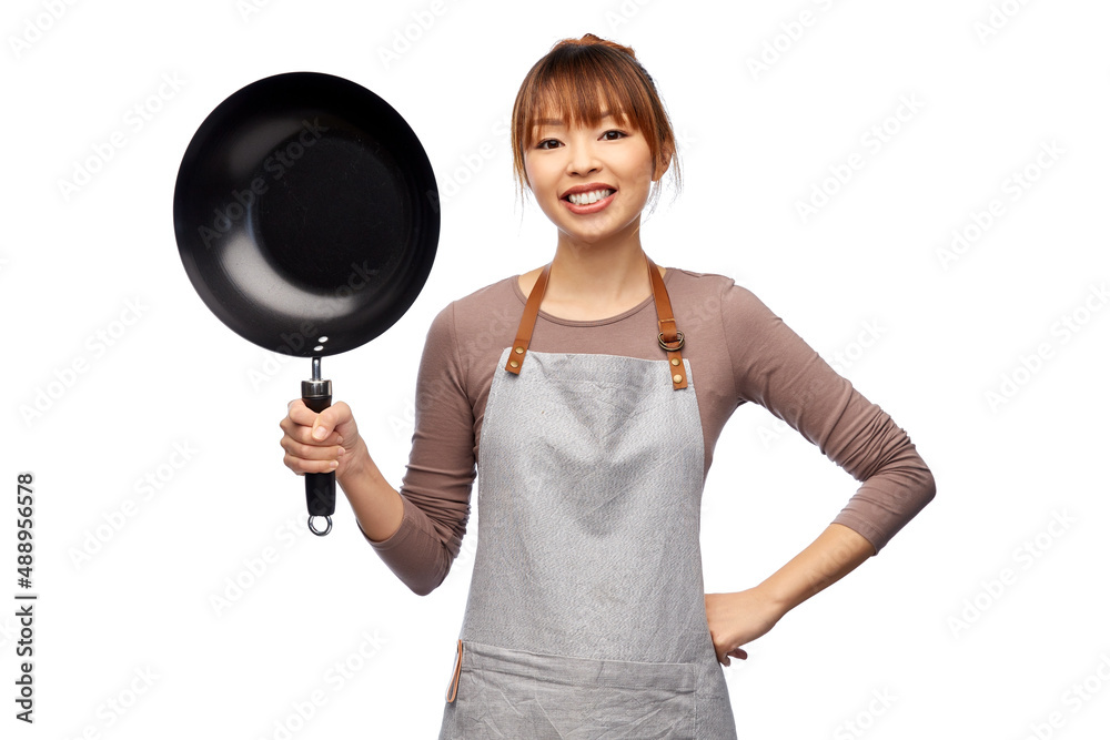 cooking, culinary and people concept - happy smiling female chef in apron with frying pan over white background cooking, culinary and people concept - happy smiling female chef in apron with frying pan over white background