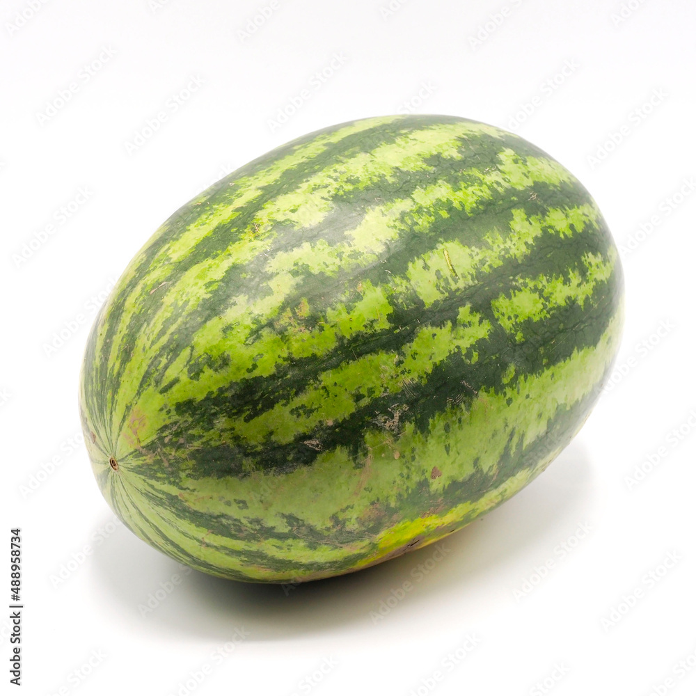A whole fresh watermelon on white background. A whole fresh watermelon on white background.