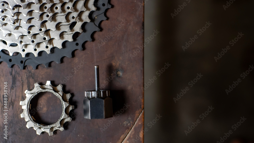 Bicycle tools on the wooden table with negative space for words Bicycle tools on the wooden table with negative space for words