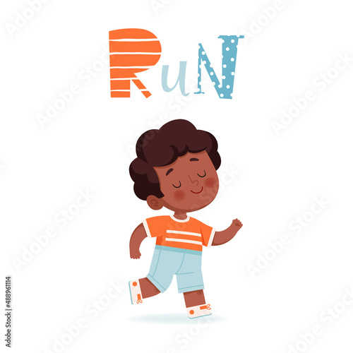 The kid runs or participates in running competitions. A cute child is engaged in athletics. The concept of sports, school activities for children