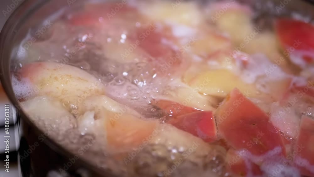 Cooking Healthy Apple Compote, Boiled Compote in a Boiling Saucepan on