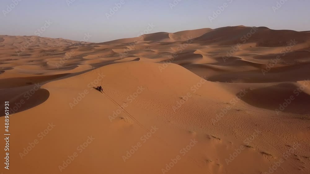 AERIAL: ATV Driving in Sahara Desert AERIAL: ATV Driving in Sahara Desert