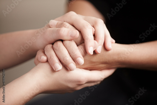 Youll be okay, I promise. Cropped shot of two people holding hands in comfort. © Alexandra/peopleimages.com
